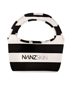 The NANZSKIN RIVIERA POUCH embodies the pinnacle of sophisticated beauty organization. This architecturally inspired masterpiece transcends ordinary storage, becoming an essential companion for the discerning skincare connoisseur. Meticulously crafted in our signature monochrome palette, this limited-edition pouch represents the intersection of European luxury and clinical precision—where form meets function in perfect harmony.